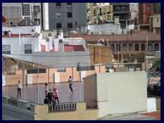 Views from Torres de Serranos 43 - Children playing on the rooftop